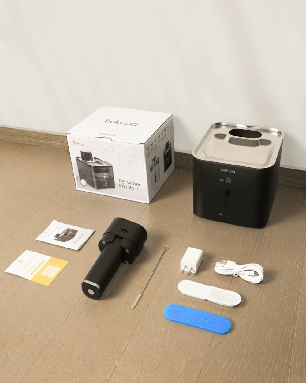 Package includes fountain, filters, cable, and manual, cleaning brush